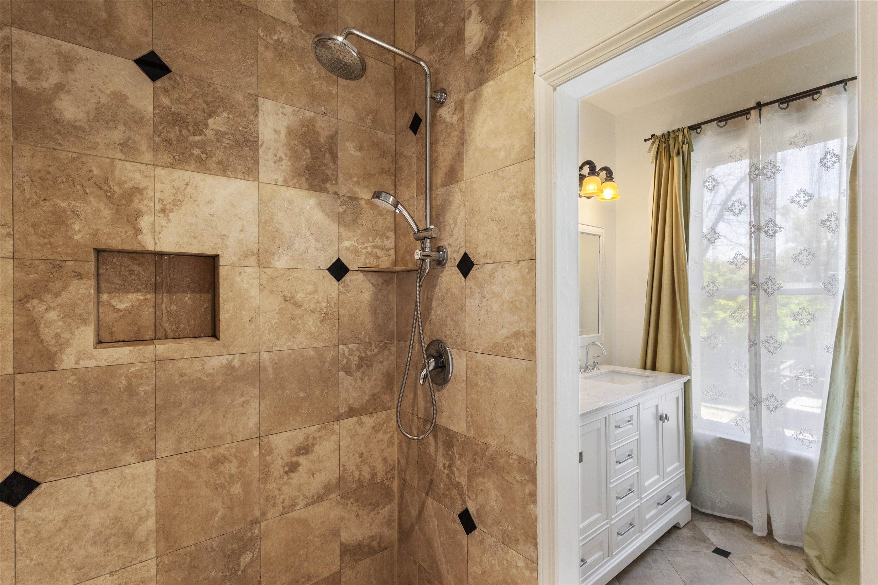1680 Carruthers Place Memphis, TN 38112 - Photo 22 of 39 a bathroom with a shower