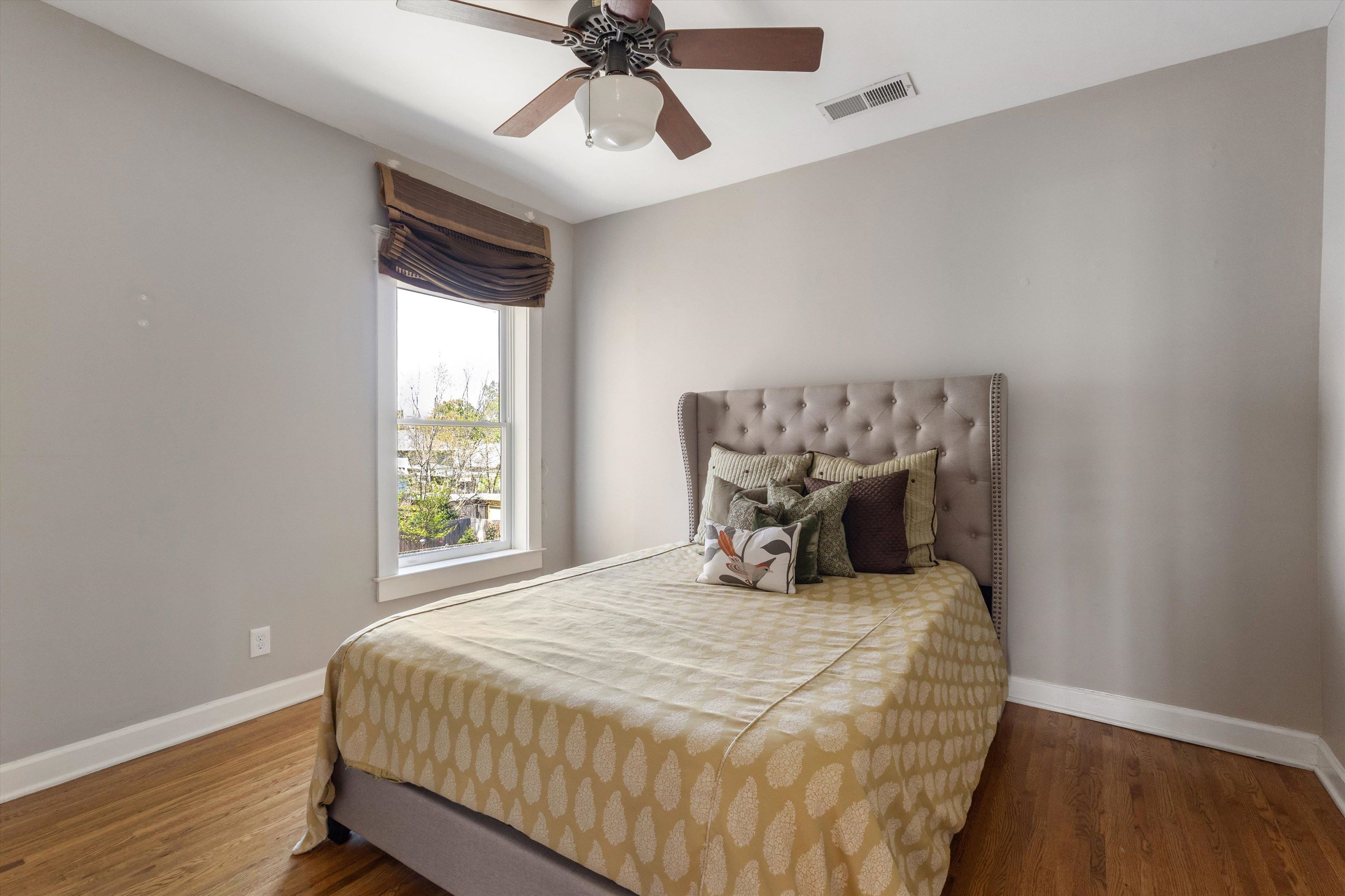 1680 Carruthers Place Memphis, TN 38112 - Photo 26 of 39 a bedroom with a bed and window