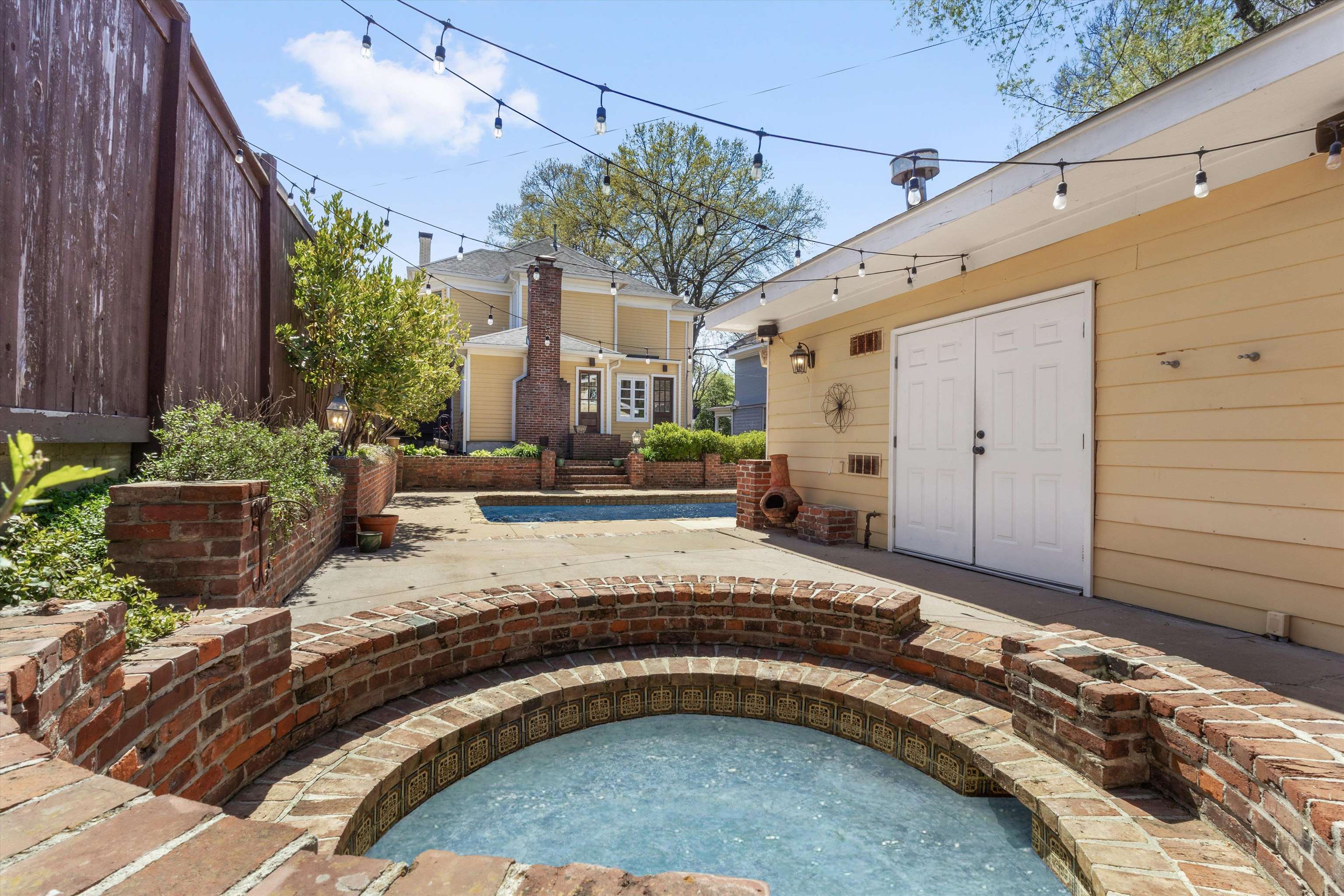 1680 Carruthers Place Memphis, TN 38112 - Photo 31 of 39 a view of a house with a patio