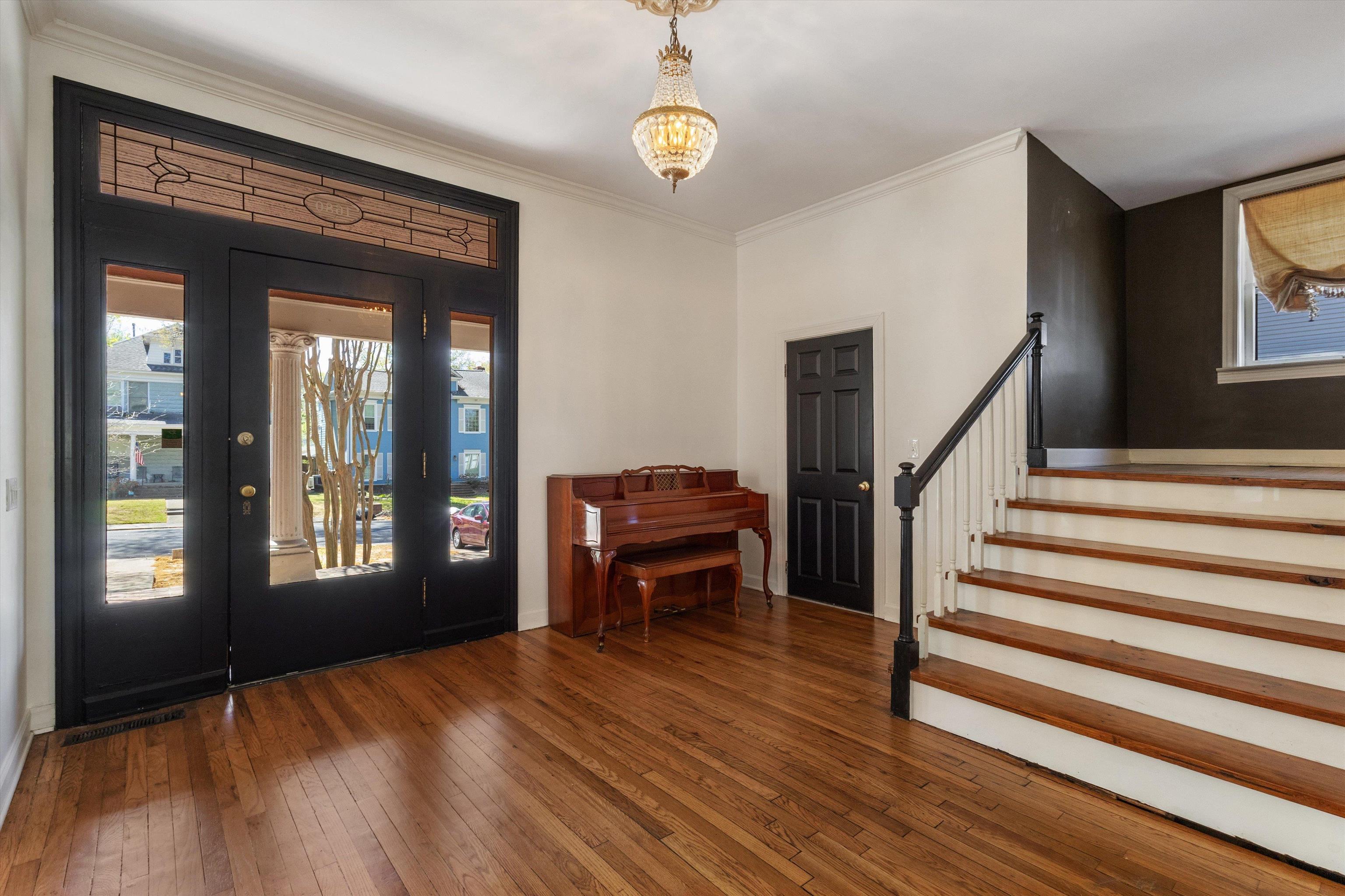 1680 Carruthers Place Memphis, TN 38112 - Photo 5 of 39 a view of an entryway with wooden floor