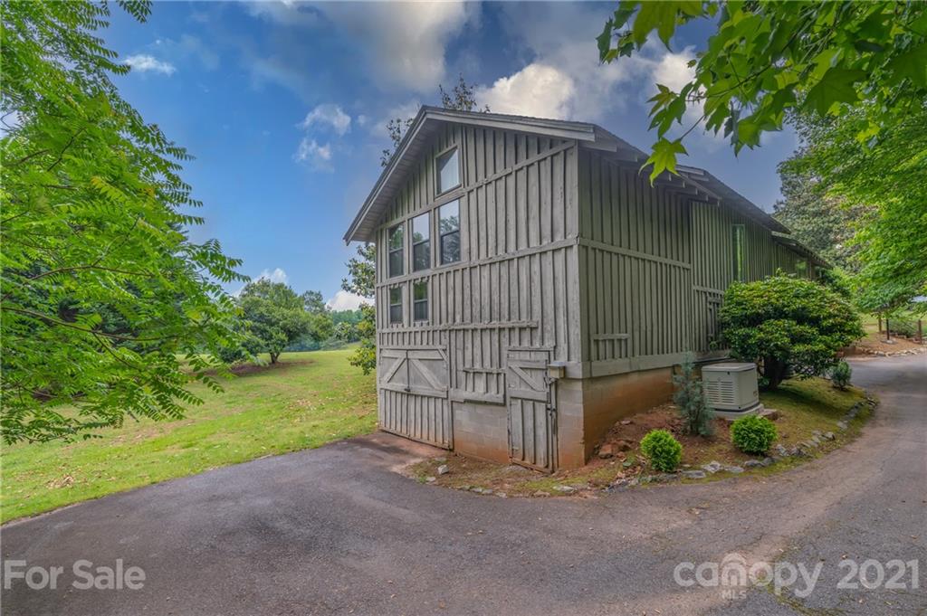 133 Ridgetop Road, Unit 16 Tryon, NC 28782 - Photo 3 of 23 a view of backyard and entertaining space