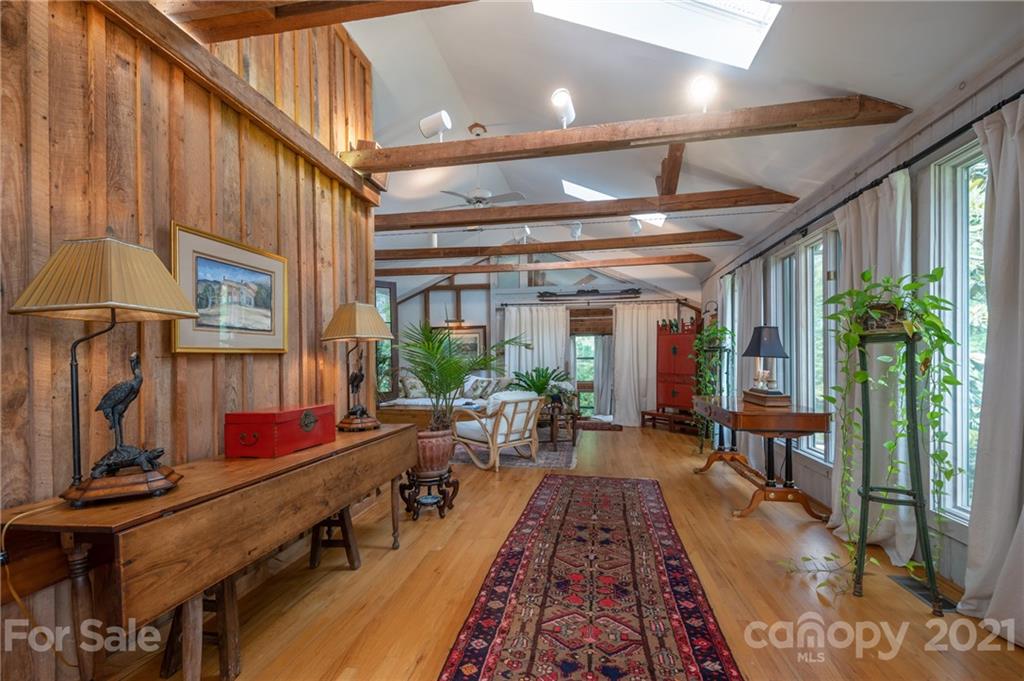 133 Ridgetop Road, Unit 16 Tryon, NC 28782 - Photo 7 of 23 a very nice looking living room with furniture