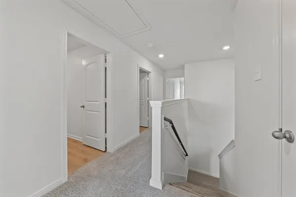 a view of hallway with stairs