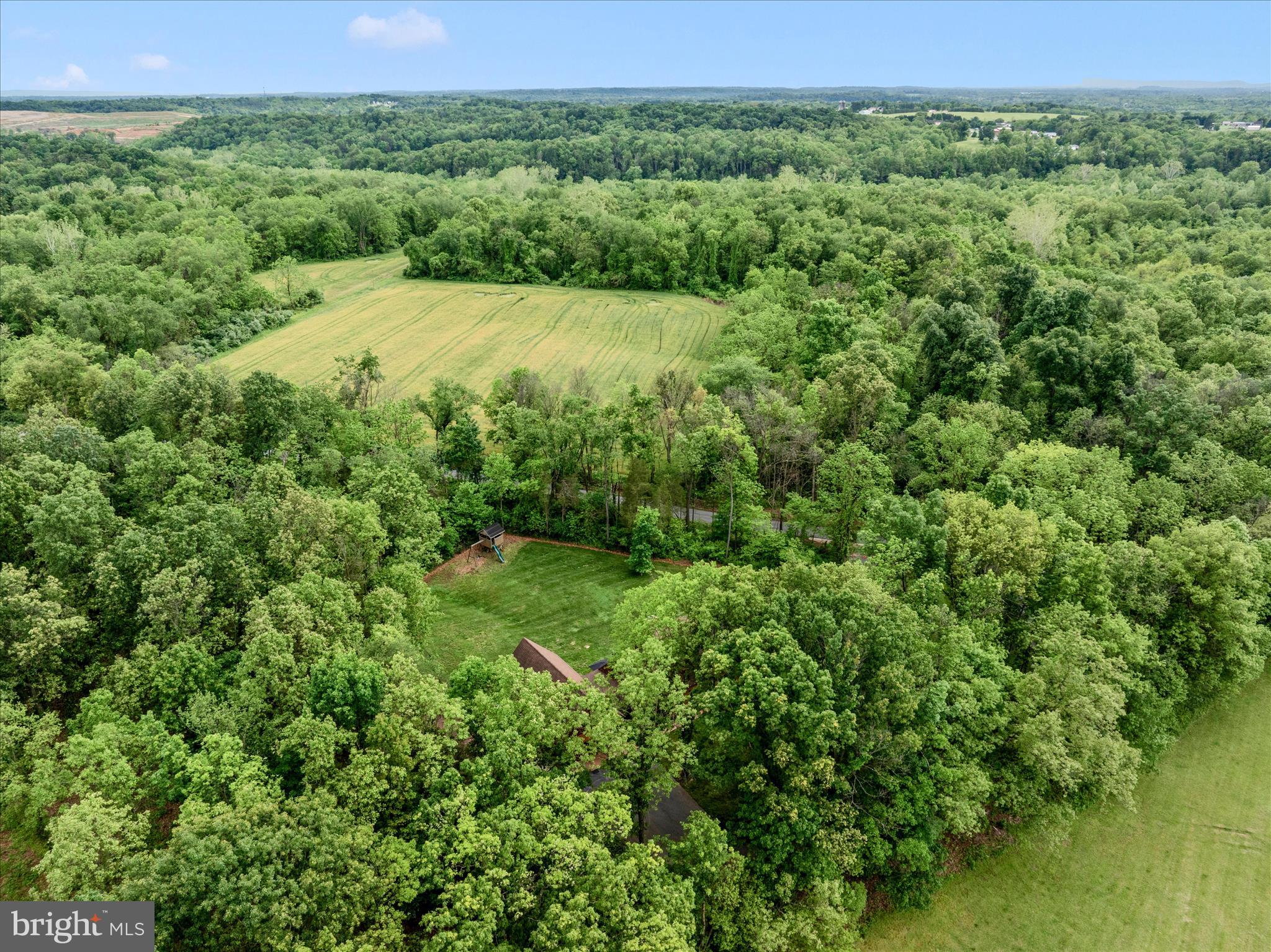 15810 Spade Road Hagerstown, MD 21740 - Photo 48 of 76 a view of a green field with lots of bushes