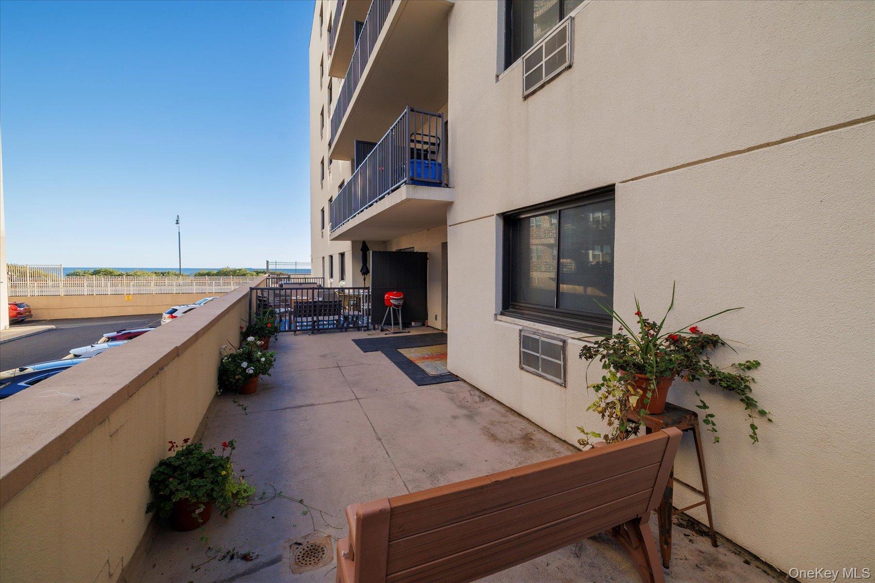 a lobby with furniture and flat screen tv