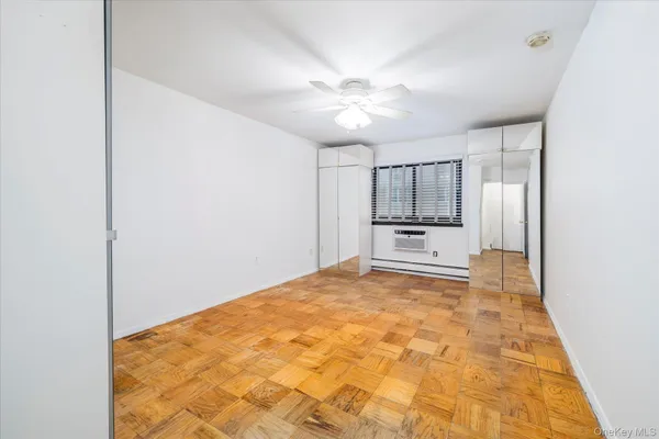 a view of a room with a sink and cabinet