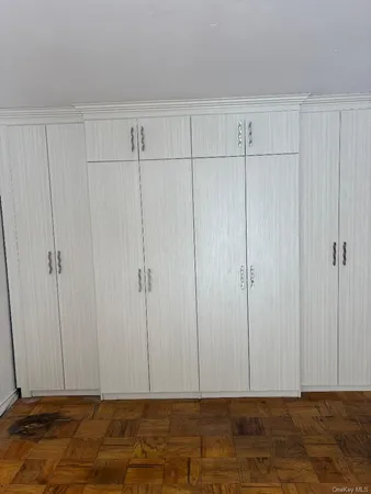 a view of room with hardwood floor