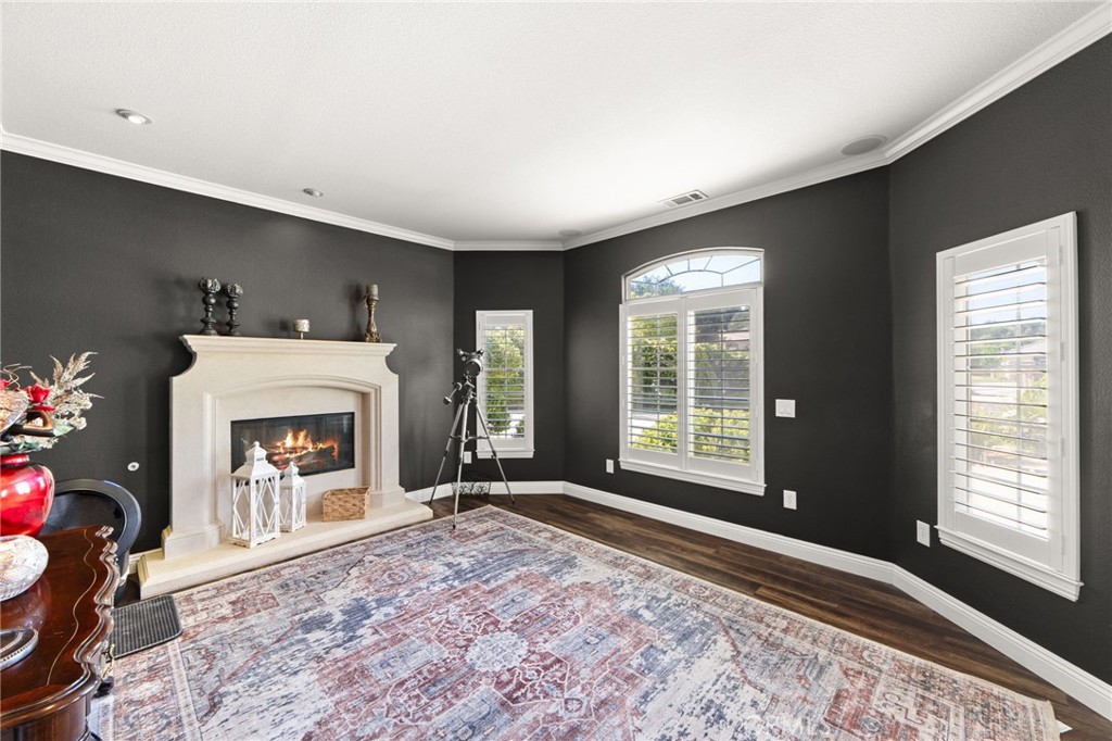 38136 Butterfly Court Yucaipa, CA 92399 - Photo 28 of 71 a living room with furniture and a fireplace