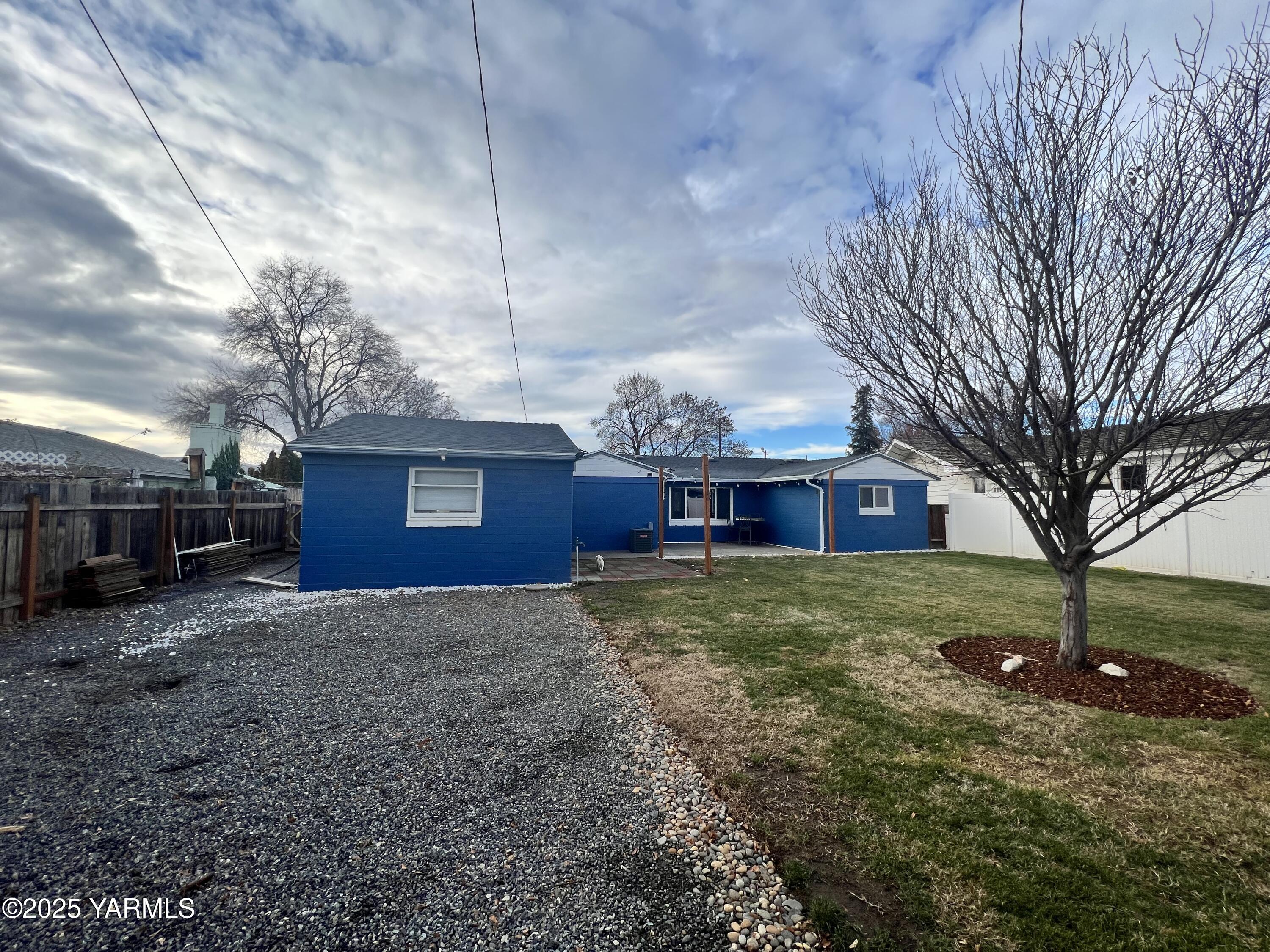 3609 South 3rd Street Union Gap, WA 98903 - Photo 11 of 14 a view of a house with a yard