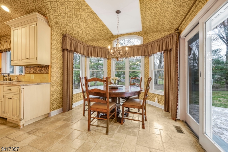 47 Abbott Road Montville, NJ 07082 - Photo 11 of 32 a view of a dining room with furniture large windows and wooden floor