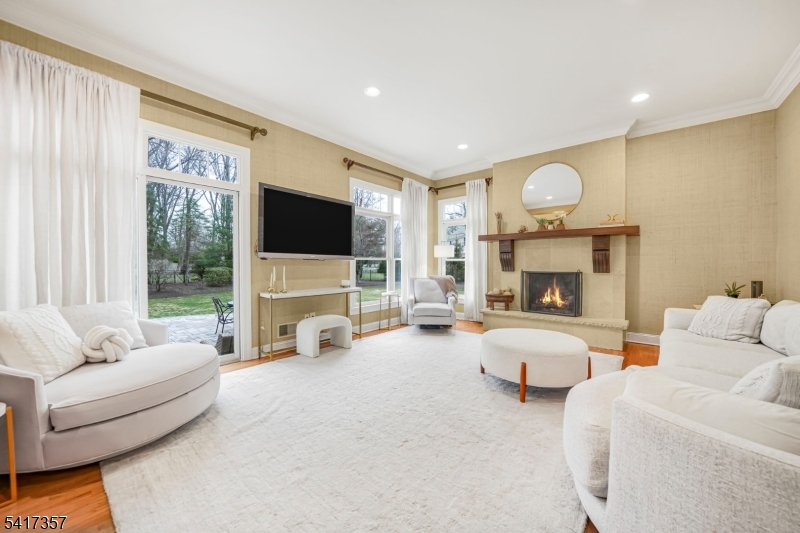 47 Abbott Road Montville, NJ 07082 - Photo 13 of 32 a living room with furniture a window and a fireplace