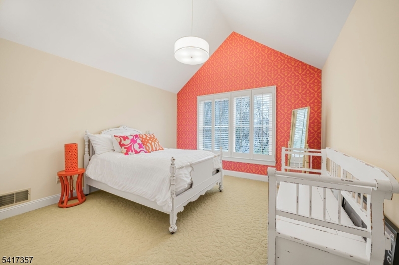 47 Abbott Road Montville, NJ 07082 - Photo 22 of 32 a bedroom with furniture and a window