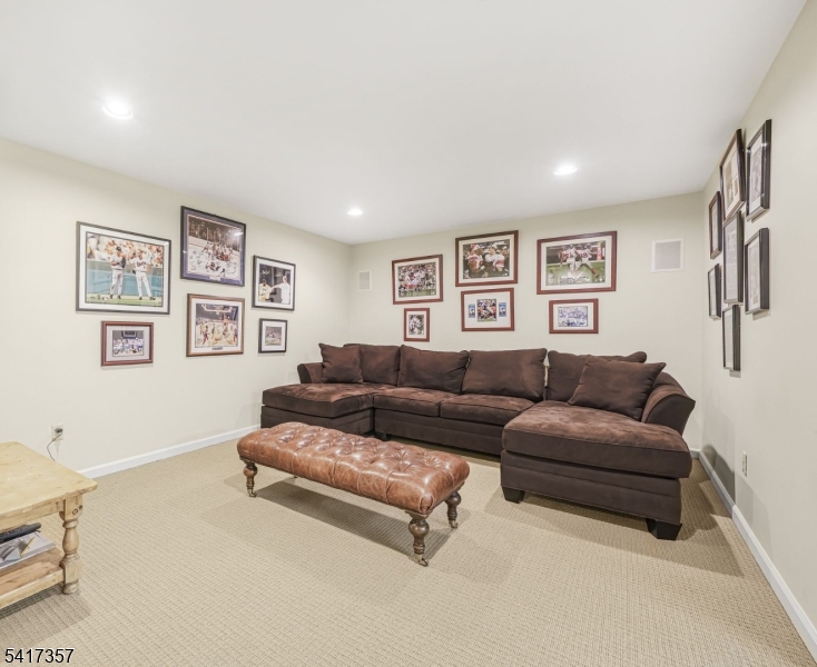 47 Abbott Road Montville, NJ 07082 - Photo 25 of 32 a living room with furniture and a window