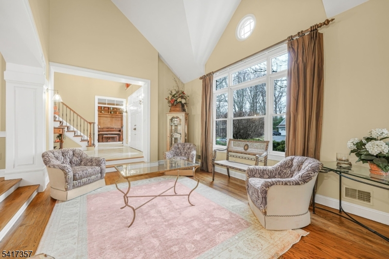 47 Abbott Road Montville, NJ 07082 - Photo 4 of 32 a living room with furniture and a large window