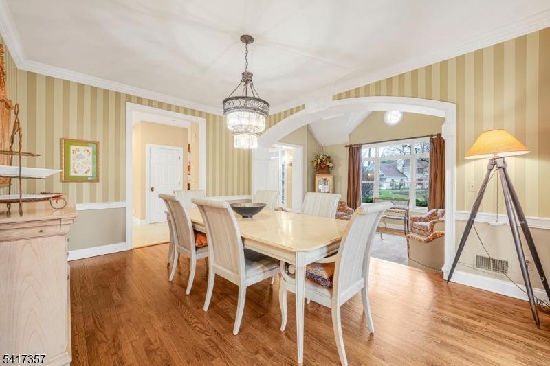 47 Abbott Road Montville, NJ 07082 - Photo 6 of 32 a view of a dining room with furniture wooden floor and a chandelier
