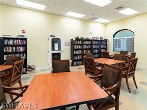 a dinning table and chairs in a room
