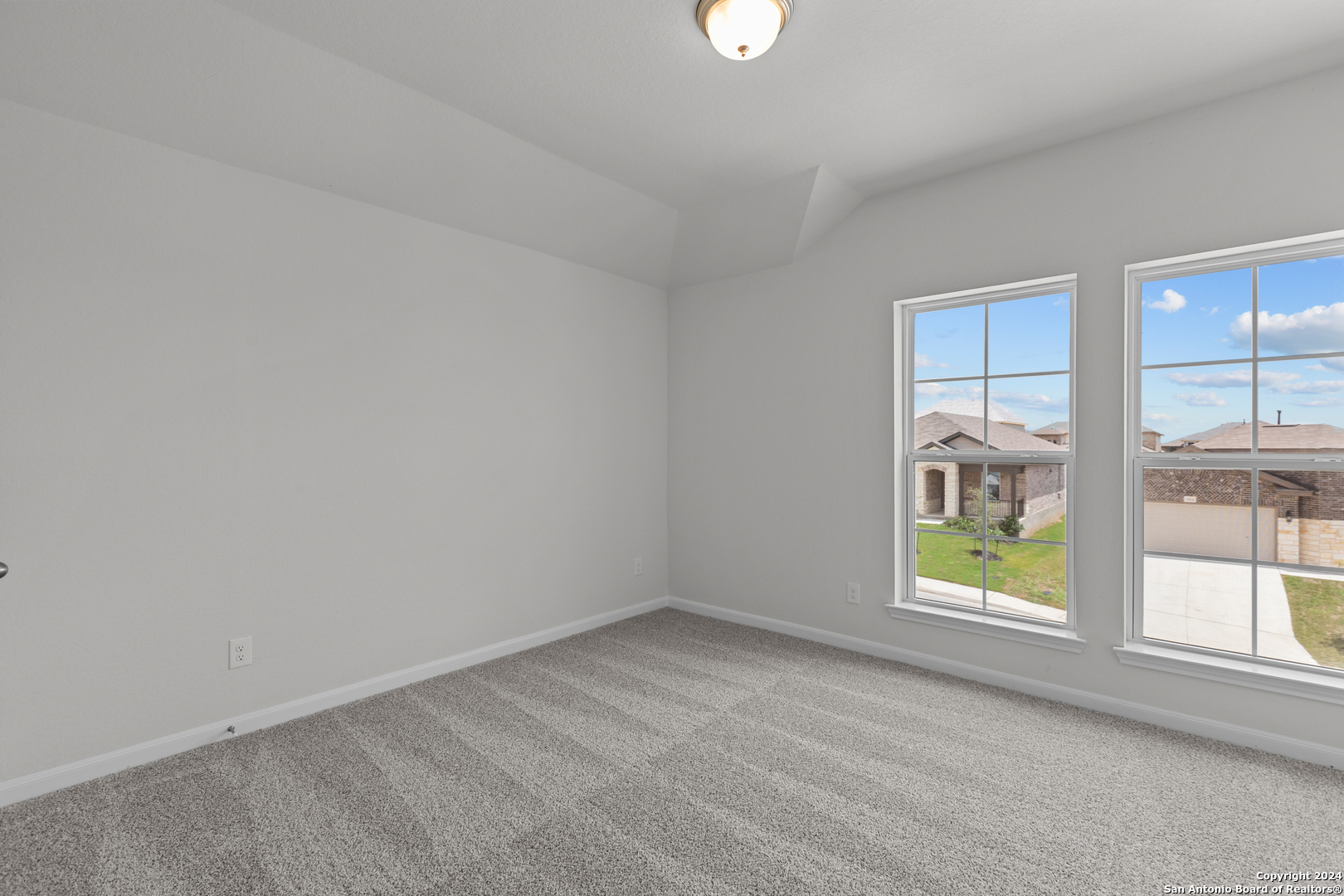 10515 Briceway Bay Helotes, TX 78254 - Photo 11 of 15 an empty room with windows