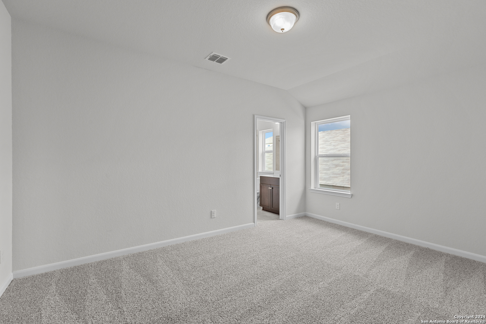 10515 Briceway Bay Helotes, TX 78254 - Photo 12 of 15 a view of an empty room with a window