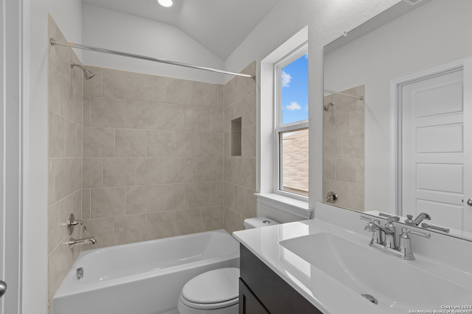 10515 Briceway Bay Helotes, TX 78254 - Photo 14 of 15 a bathroom with a sink toilet and shower