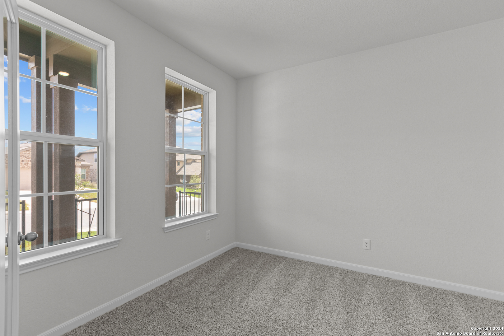 10515 Briceway Bay Helotes, TX 78254 - Photo 2 of 15 an empty room with windows and closet