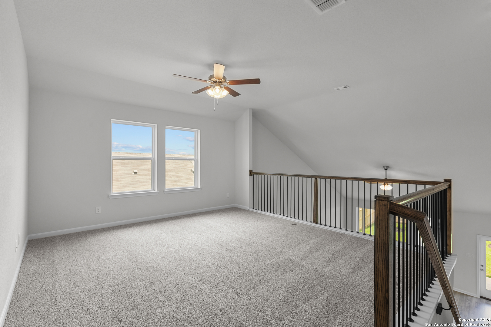 10515 Briceway Bay Helotes, TX 78254 - Photo 8 of 15 a view of an empty room with a window