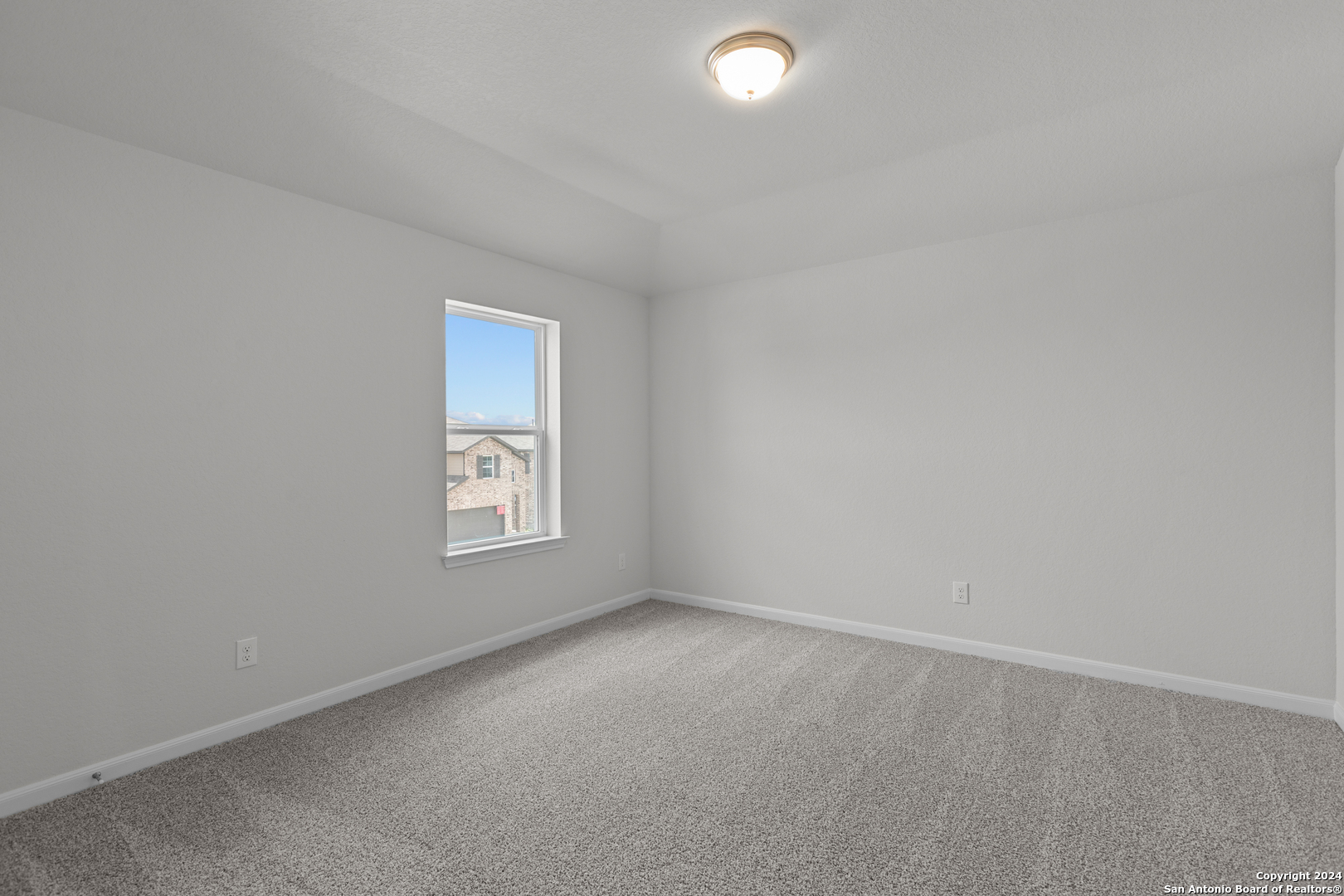 10515 Briceway Bay Helotes, TX 78254 - Photo 9 of 15 an empty room with a window