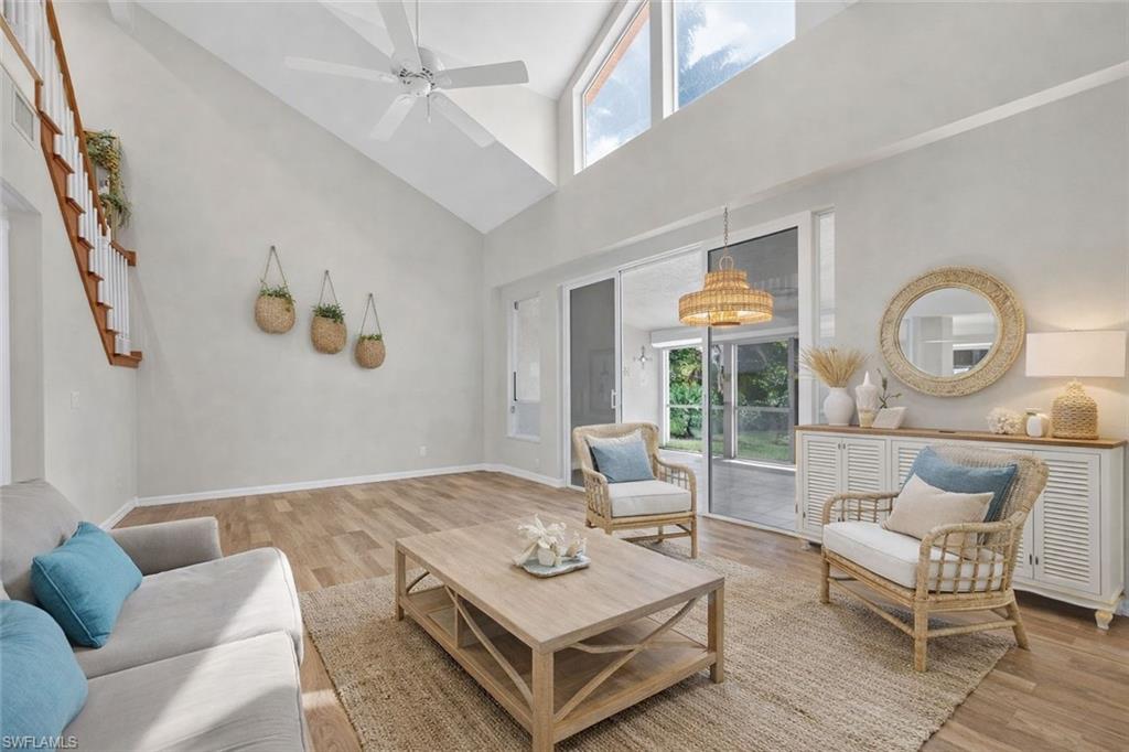 8534 Chase Preserve Drive Naples, FL 34113 - Photo 24 of 44 VIRTUALLY STAGED to show Modern Coastal Living Room