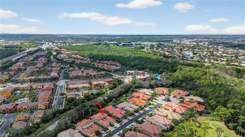 8534 Chase Preserve Drive Naples, FL 34113 - Photo 39 of 44 Aerial view of residential area