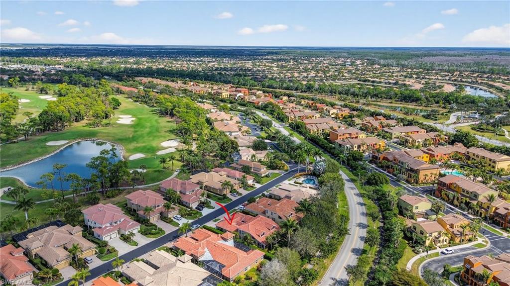 8534 Chase Preserve Drive Naples, FL 34113 - Photo 40 of 44 Aerial perspective of area with a large body of water and a golf course