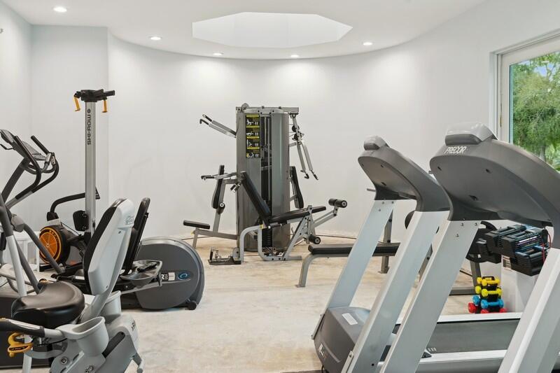 1130 Southwest Chapman Way, Unit 509 Palm City, FL 34990 - Photo 23 of 29 a view of a room with gym equipment