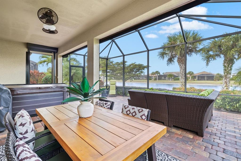 13856 RINUCCIO Street Venice, FL 34293 - Photo 33 of 63 a living room with furniture and a large window