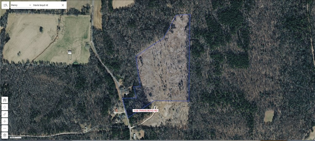 0 Travis Boyd Road Mansfield, TN 38236 - Photo 6 of 6 a view of a house with a yard