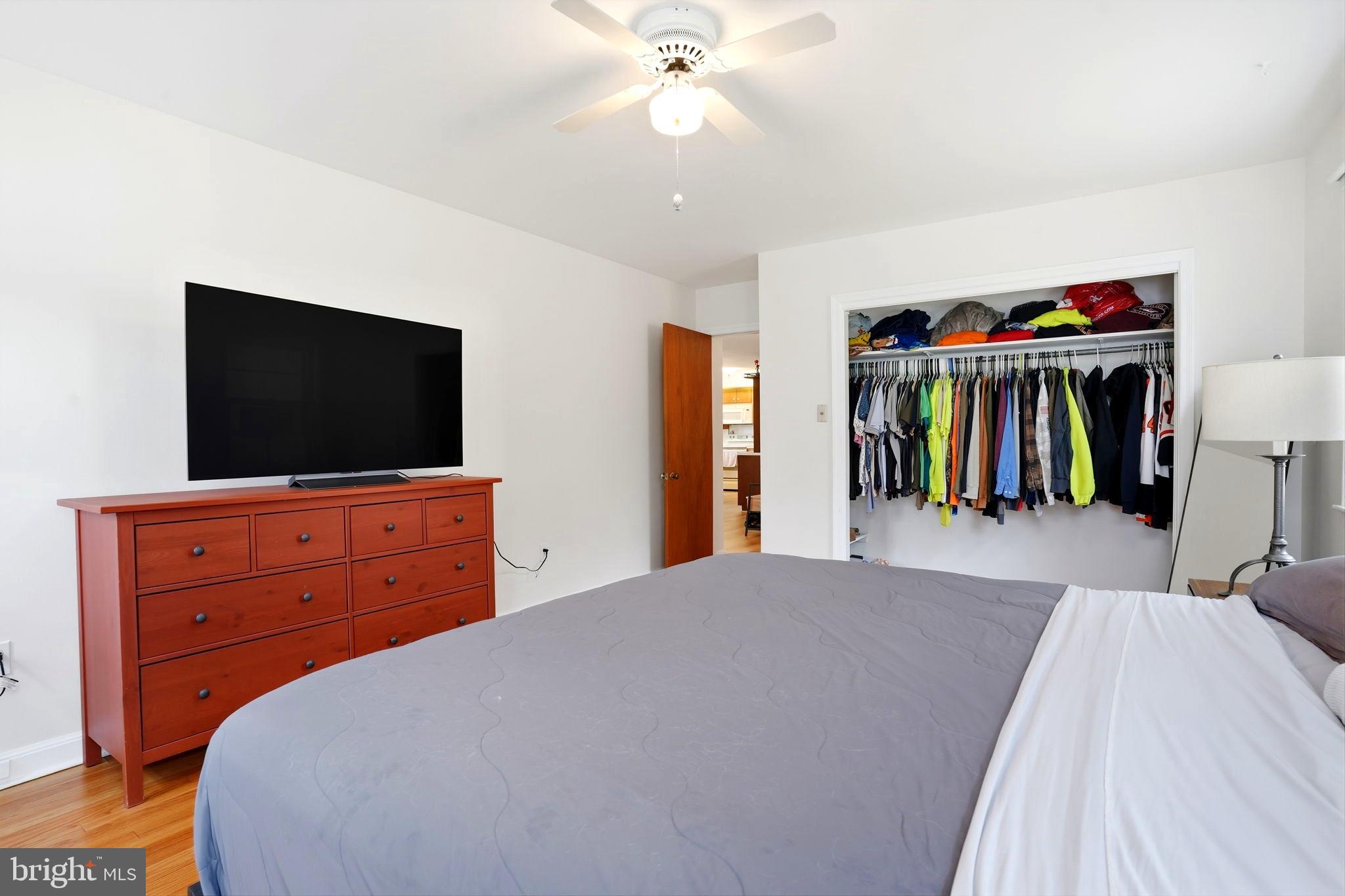116 Green Street Green Lane, PA 18054 - Photo 14 of 38 a bedroom with a bed and a flat tv screen on dresser