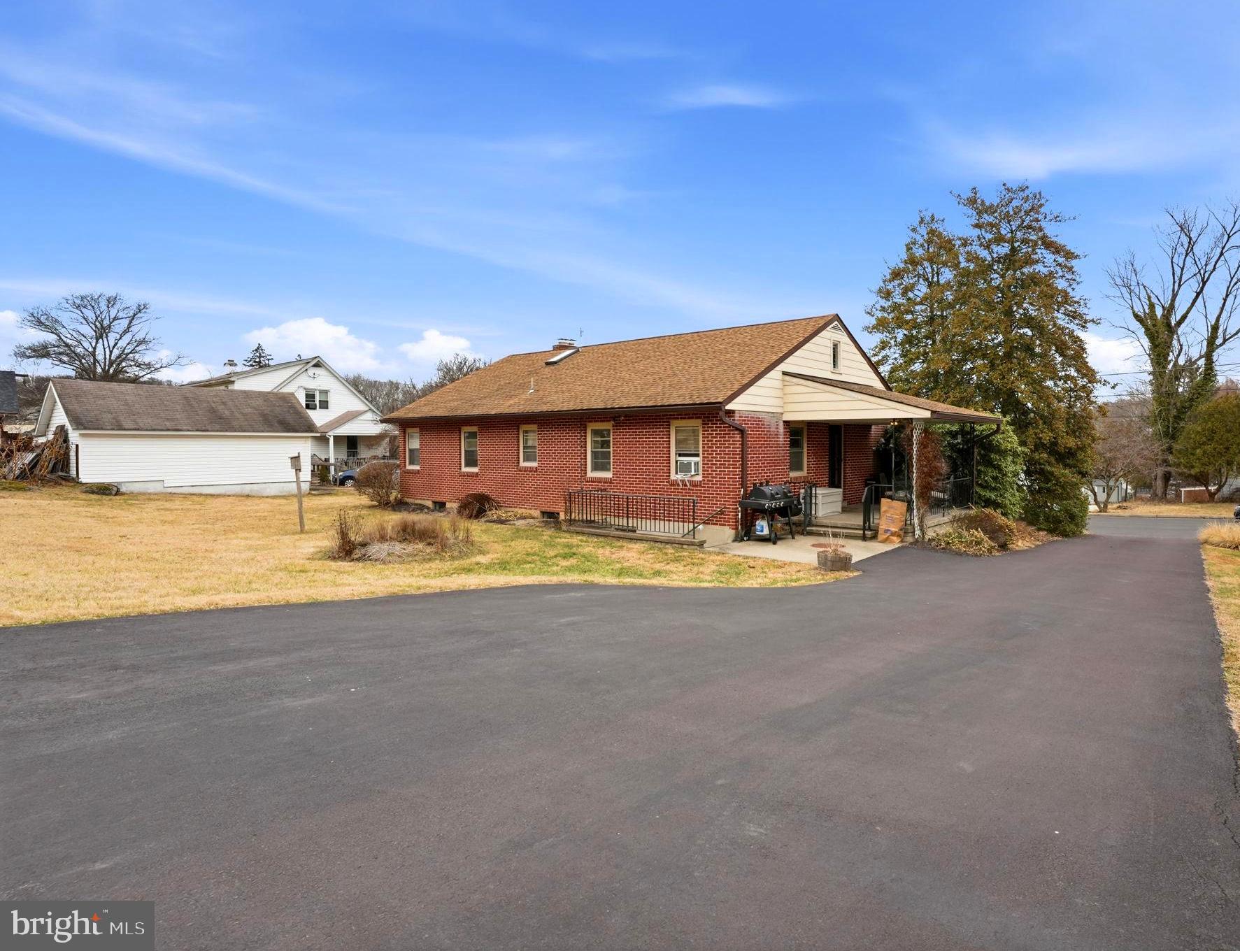 116 Green Street Green Lane, PA 18054 - Photo 3 of 38 a view of a house with swimming pool and a yard