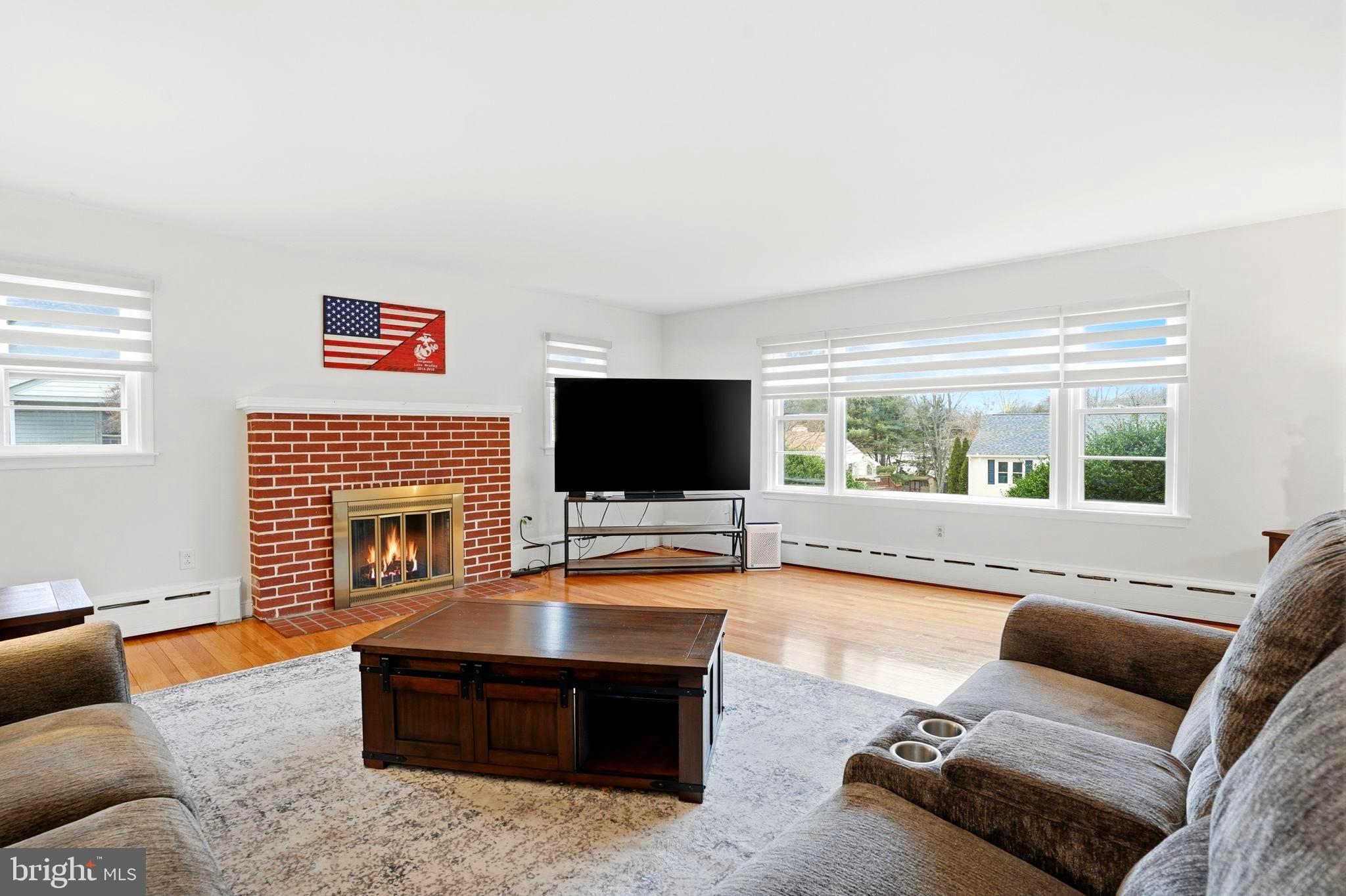 116 Green Street Green Lane, PA 18054 - Photo 5 of 38 a living room with furniture and a flat screen tv