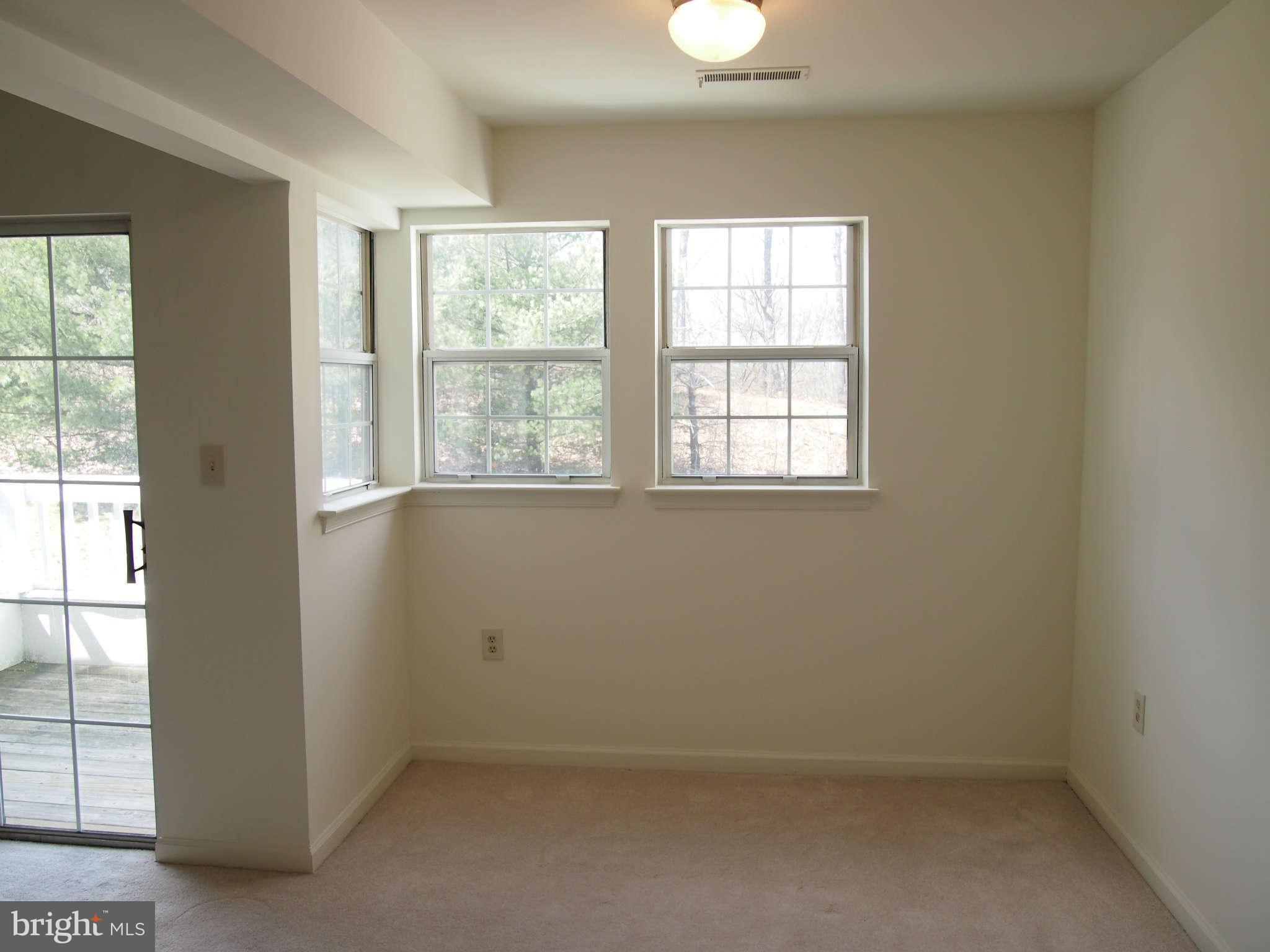 8390 Montgomery Run Road, Unit I Ellicott City, MD 21043 - Photo 5 of 12 Dining Room