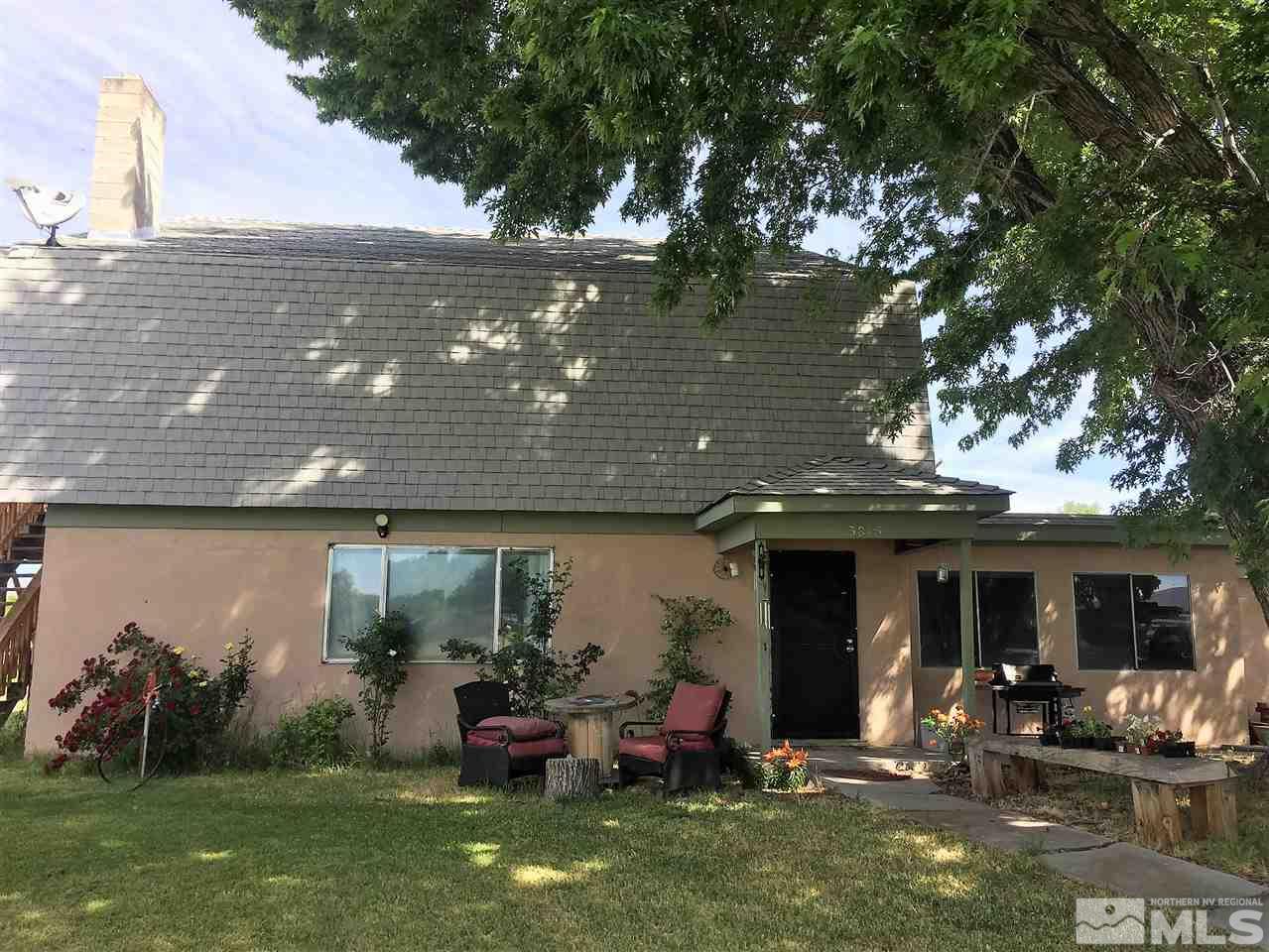 a view of a house with patio
