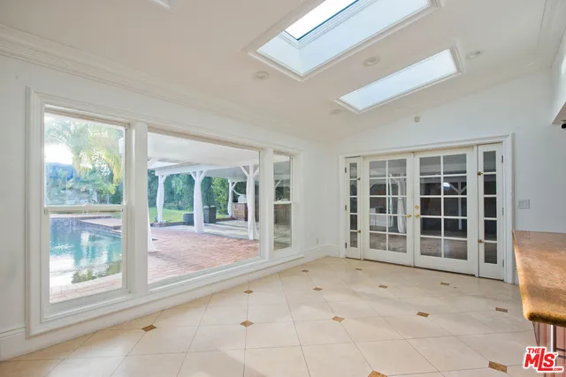 a view of a house with a large window