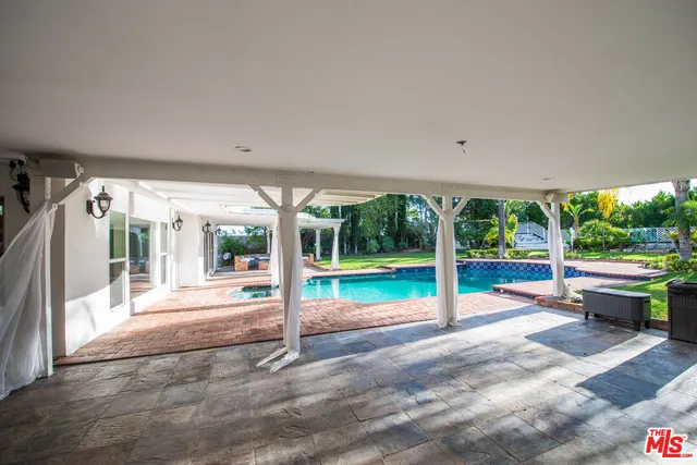 a view of outdoor space with porch and furniture