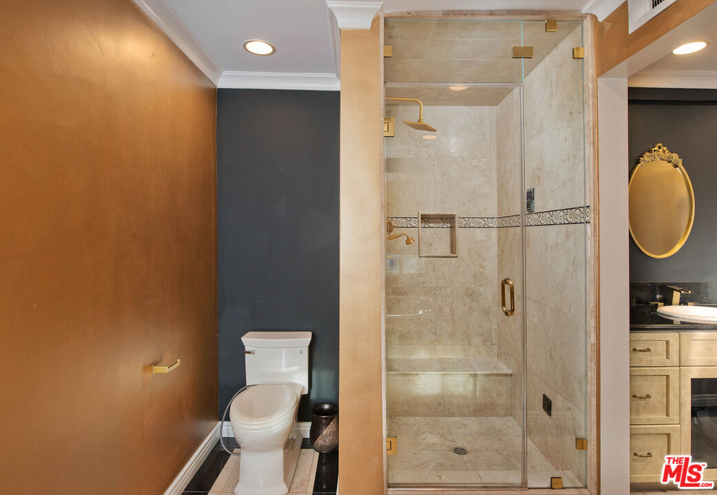 11753 Castillo Lane Porter Ranch, CA 91326 - Photo 36 of 44 a bathroom with a toilet and a shower