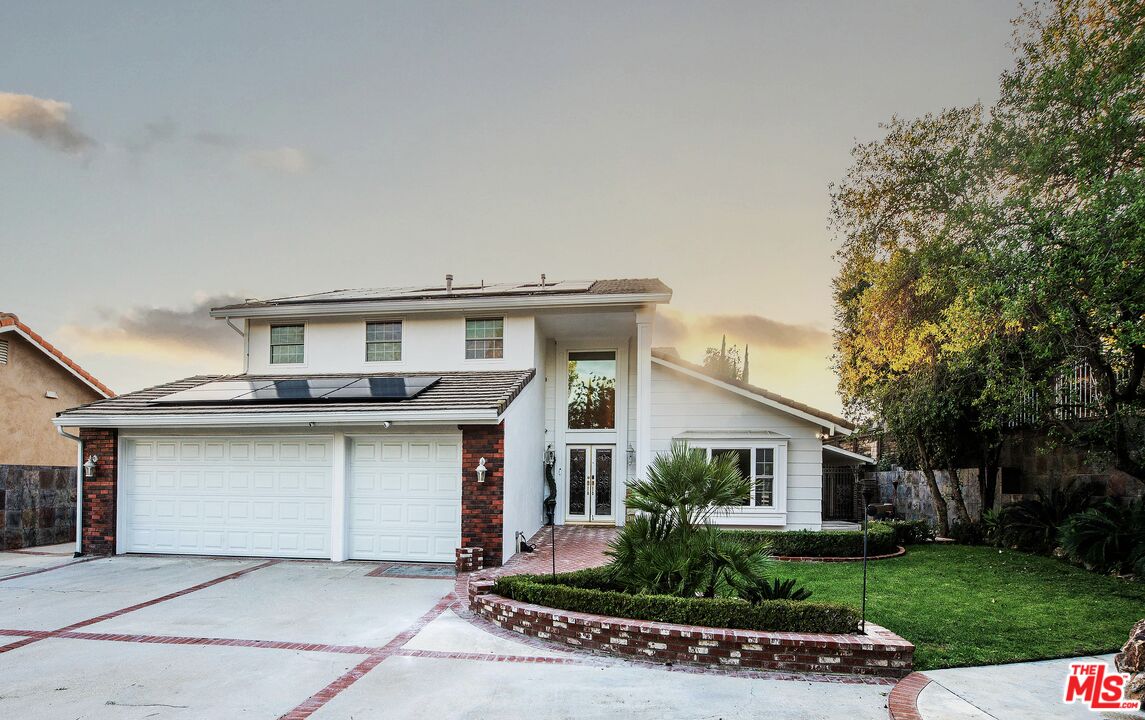 11753 Castillo Lane Porter Ranch, CA 91326 - Photo 44 of 44 a house view with a garden space