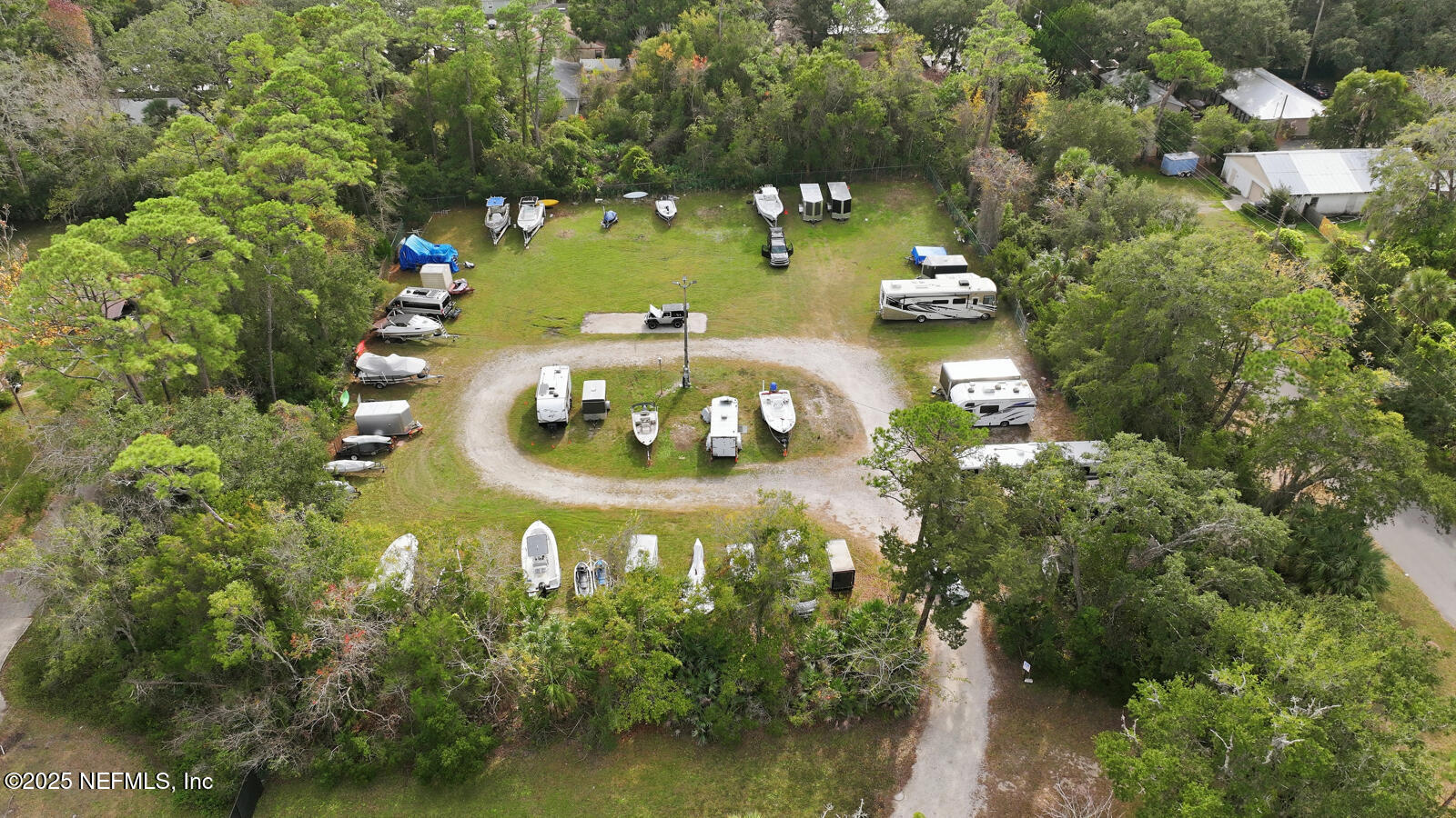 1810 Vista Cove Road St. Augustine, FL 32084 - Photo 16 of 43 an aerial view of a house with yard