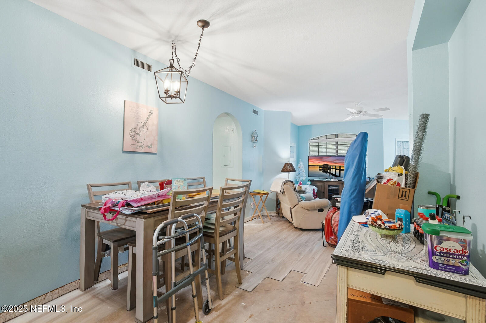 1810 Vista Cove Road St. Augustine, FL 32084 - Photo 28 of 43 a view of a dining room with furniture and chandelier