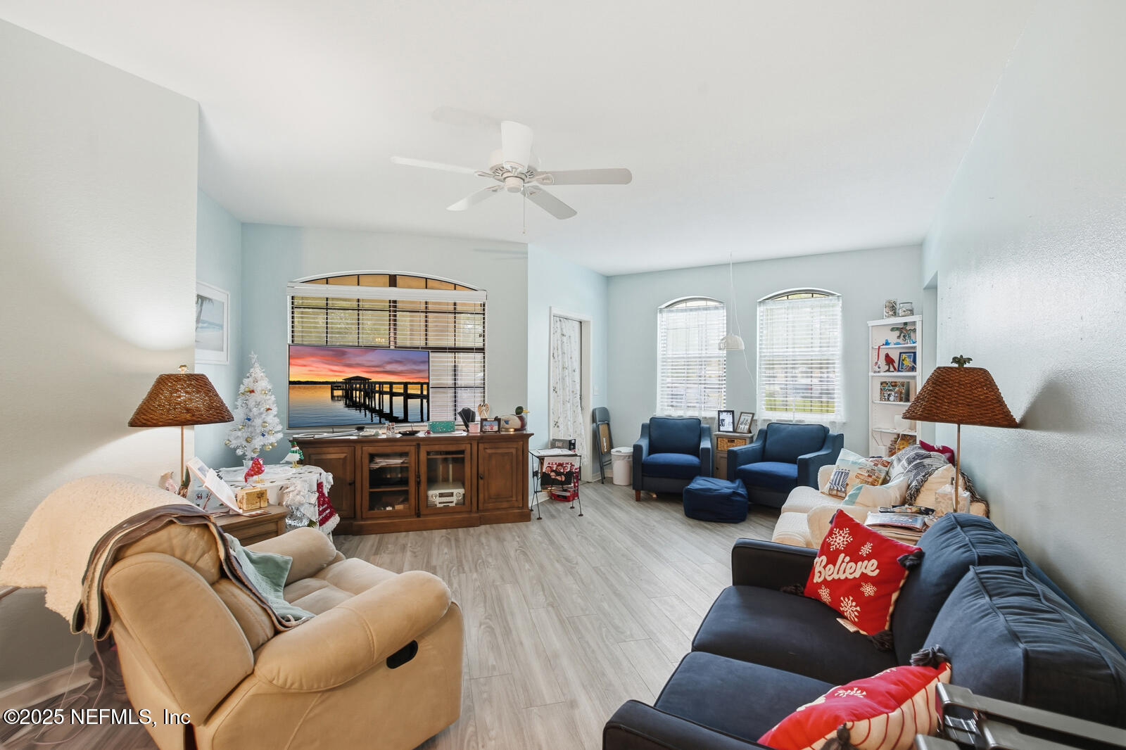 1810 Vista Cove Road St. Augustine, FL 32084 - Photo 30 of 43 a living room with furniture ceiling fan and a window