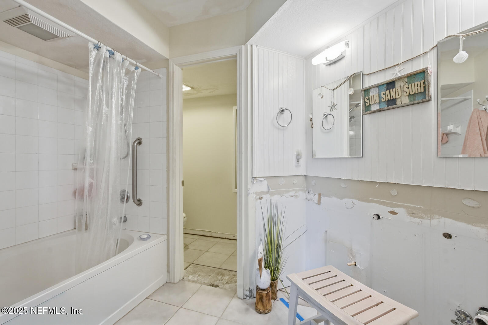 1810 Vista Cove Road St. Augustine, FL 32084 - Photo 36 of 43 a bathroom with a bathtub and a shower