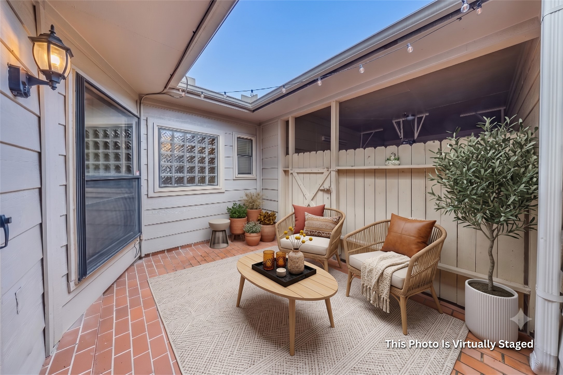 727 Bunker Hill Road, Unit 34 Houston, TX 77024 - Photo 7 of 38 The back patio makes it easy to travel between the home to the garages. This area is perfect to have a private outdoor space for relaxation.