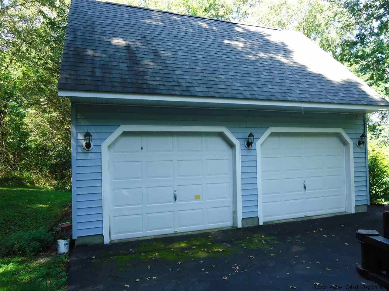 611 Hoagerburgh Road Wallkill, NY 12589 - Photo 9 of 11 a front view of a house with garden