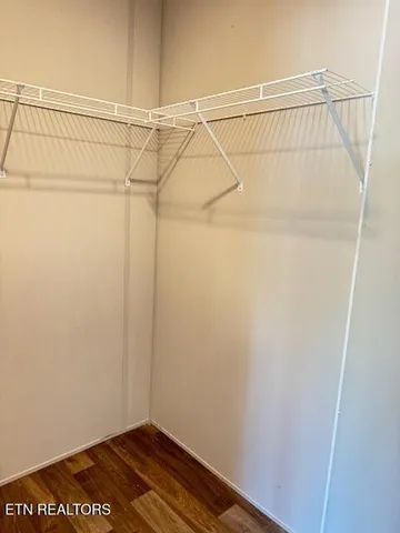 a view of a room with racks on the wall