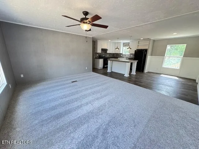 a view of a kitchen with a sink