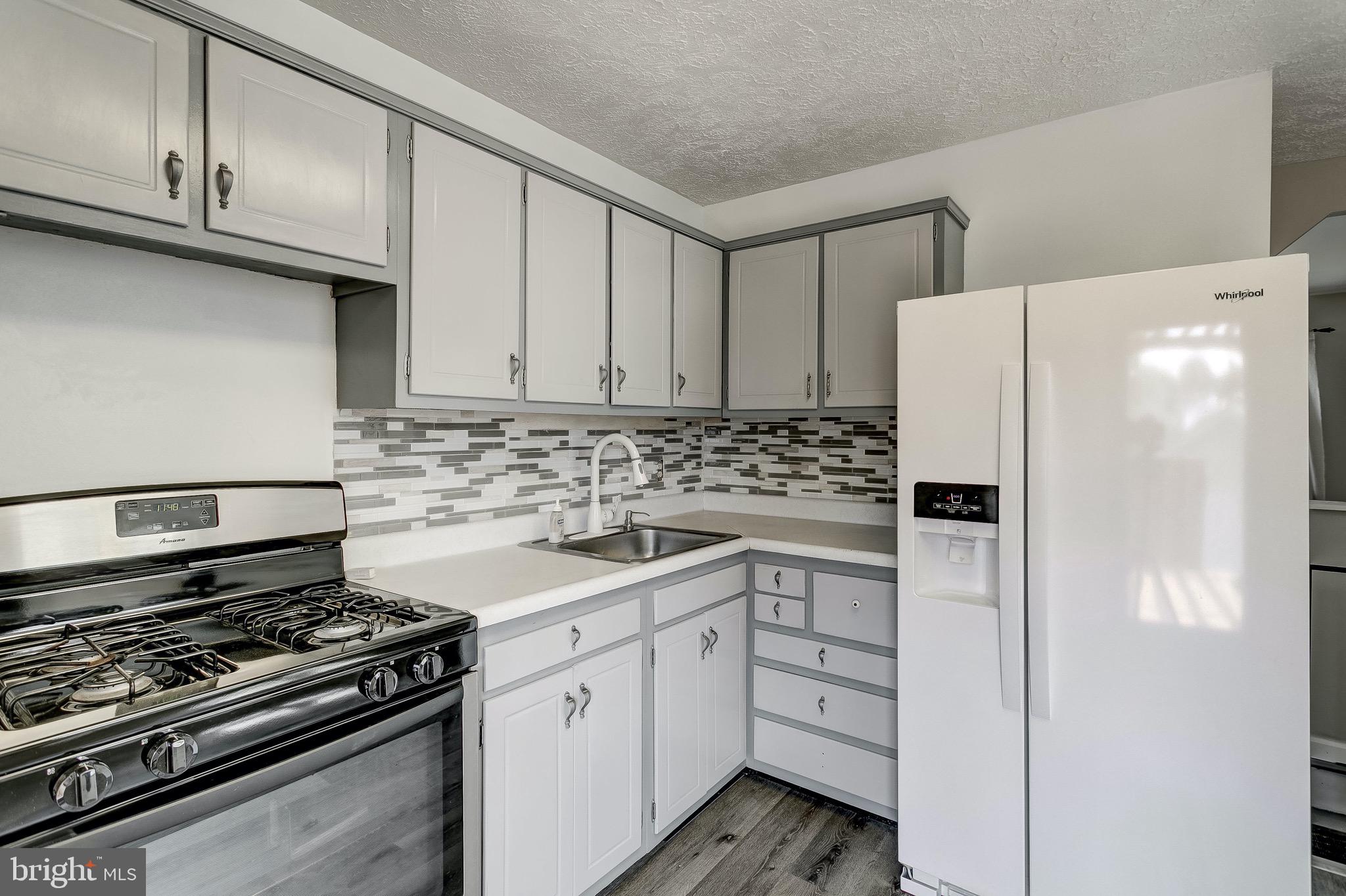 7709 Beekay Road Baltimore, MD 21219 - Photo 12 of 35 Painted Cabinets!